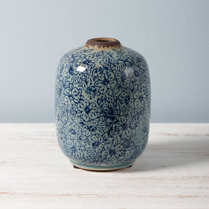 Vase cylindrique bleu fleuri