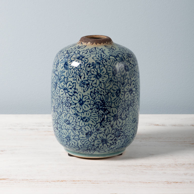 Vase cylindrique bleu fleuri