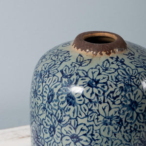Vase cylindrique bleu fleuri