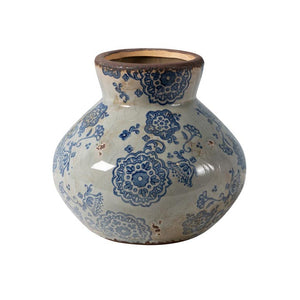 Vase évasé bleu fleuri